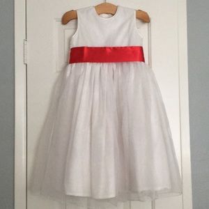 Strasburg flower girl dress with red satin ribbon